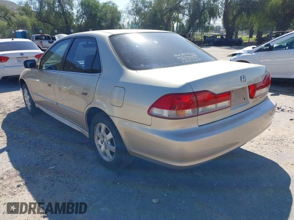 2001 Honda Accord EX z VIN JHMCG66801C014214, wystawiony jako IAAI lot #41643404 z przebiegiem 139 020 mil mil oraz . Historia ofert i sprzedaży dostępna na DreamBid. Obrazek 3.