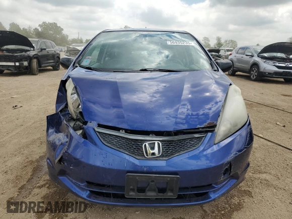 2009 Honda Fit with VIN JHMGE88229S049270, listed as a Copart auction lot 56935235 with 118,649 mi miles and Salvage title. Bid and sale history available at DreamBid. Image 5.
