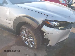 2024 Mazda CX-30 S Premium with VIN 3MVDMBDM9RM628162, listed as a IAAI auction lot 41262359 with 30,392 mi miles and . Bid and sale history available at DreamBid. Image 6.
