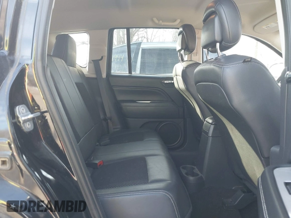 2014 Jeep Compass Latitude with VIN 1C4NJDEBXED661930, listed as a IAAI auction lot 41501558 with 94,133 mi miles and . Bid and sale history available at DreamBid. Image 8.