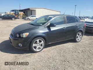 2014 Chevrolet Sonic LTZ with VIN 1G1JE5SB9E4103444, listed as a Copart auction lot 46949955 with 120,986 mi miles and Clean Title. Bid and sale history available at carsss.com. Image 1.