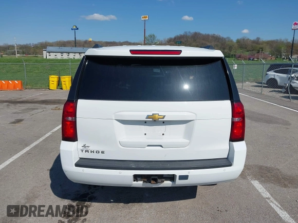 2015 Chevrolet Tahoe LT with VIN 1GNSCBKCXFR552071, listed as a IAAI auction lot 41972157 with 214,738 mi miles and . Bid and sale history available at DreamBid. Image 16.