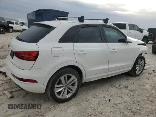 2017 Audi Q3 Premium z VIN WA1BCCFS0HR016968, wystawiony jako Copart lot #79358604 z przebiegiem Nie podano mil oraz Szkody całkowita. Historia ofert i sprzedaży dostępna na DreamBid. Obrazek 3.