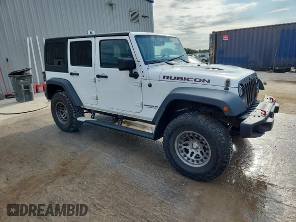 2015 Jeep Wrangler Unlimited Rubicon with VIN 1C4BJWFGXFL518301, listed as a Copart auction lot 61910775 with 153,945 mi miles and Clean title. Bid and sale history available at DreamBid. Image 4.