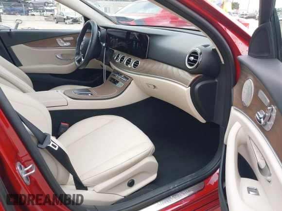 2021 Mercedes-Benz E 350 with VIN W1KZF8DB1MA977976, listed as a IAAI auction lot 42130835 with 30,584 mi miles and . Bid and sale history available at DreamBid. Image 5.