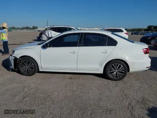 2018 Volkswagen Jetta 1.4T SE with VIN 3VWDB7AJXJM225016, listed as a IAAI auction lot 41309884 with 57,773 mi miles. Bid and sale history available at carsss.com. Image 13.