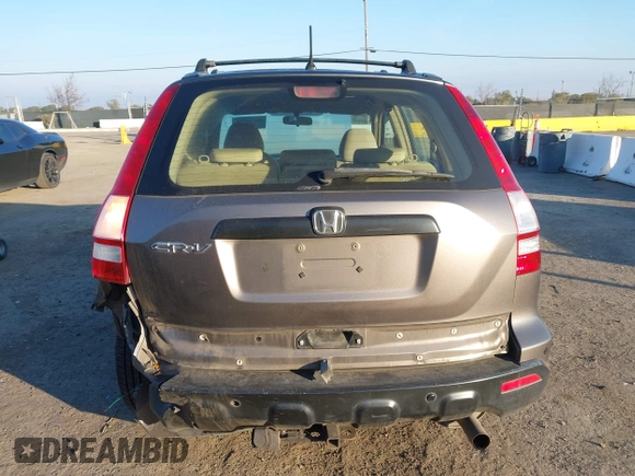 2009 Honda CR-V LX with VIN 5J6RE48389L011915, listed as a IAAI auction lot 41301796 with 214,807 mi miles. Bid and sale history available at carsss.com. Image 17.