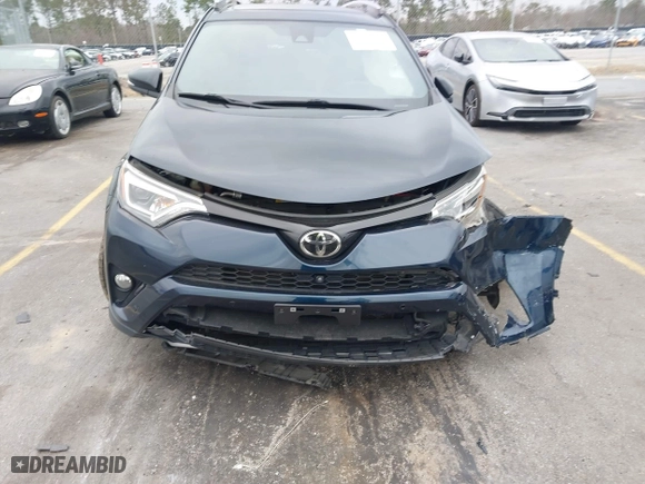 2017 Toyota RAV4 SE with VIN JTMJFREV0HD200683, listed as a IAAI auction lot 41595927 with 109,981 mi miles. Bid and sale history available at carsss.com. Image 12.