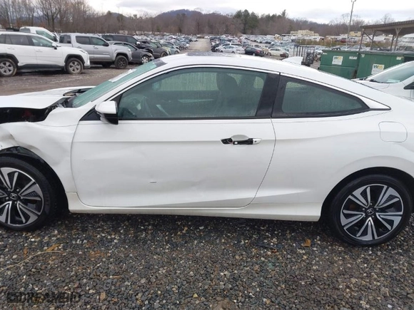 2018 Honda Civic Coupe EX-L with VIN 2HGFC3B76JH352964, listed as a IAAI auction lot 41299637 with 123,751 mi miles. Bid and sale history available at carsss.com. Image 14.