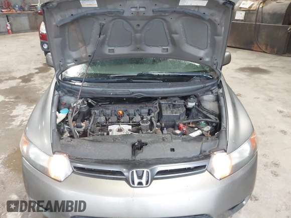 2008 Honda Civic Cpe EX with VIN 2HGFG12878H559388, listed as a IAAI auction lot 42184557 with 164,412 mi miles. Bid and sale history available at carsss.com. Image 9.