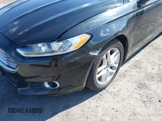 2014 Ford Fusion SE with VIN 1FA6P0HDXE5370384, listed as a IAAI auction lot 41973412 with 147,459 mi miles and . Bid and sale history available at DreamBid. Image 13.
