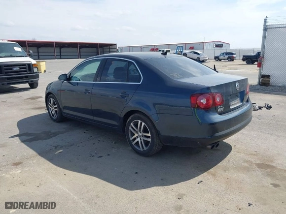2010 Volkswagen Jetta Sedan SE with VIN 3VWRZ7AJ8AM020568, listed as a IAAI auction lot 41801729 with 210,981 mi miles. Bid and sale history available at carsss.com. Image 3.
