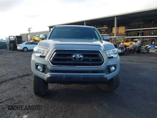 2020 Toyota Tacoma SR5 with VIN 3TMCZ5AN7LM366243, listed as a IAAI auction lot 41399117 with 58,126 mi miles and . Bid and sale history available at DreamBid. Image 12.
