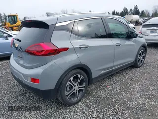 2020 Chevrolet Bolt EV Premier with VIN 1G1FZ6S08L4145700, listed as a IAAI auction lot 41762056 with 13,466 mi miles. Bid and sale history available at carsss.com. Image 4.