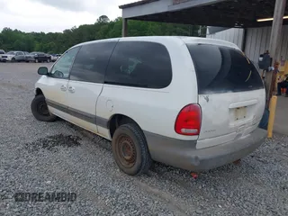 1999 Dodge Caravan SE with VIN 1B4GP44G1XB894210, listed as a IAAI auction lot 42122444 with 352,473 mi miles and . Bid and sale history available at carsss.com. Image 3.