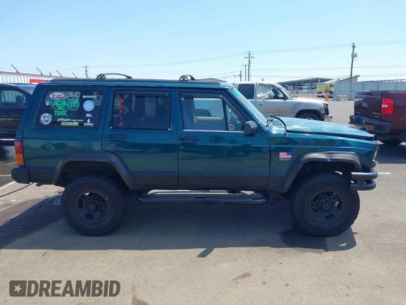 1995 Jeep Cherokee Sport with VIN 1J4FJ68S7SL631078, listed as a IAAI auction lot 42408148 with 190,765 mi miles and . Bid and sale history available at DreamBid. Image 13.