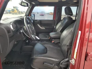 2013 Jeep Wrangler Unlimited Freedom z VIN 1C4BJWDG7DL582764, wystawiony jako Copart lot #54133275 z przebiegiem 183 507 mil mil oraz Szkoda całkowita • Salvage title. Historia ofert i sprzedaży dostępna na DreamBid. Obrazek 7.