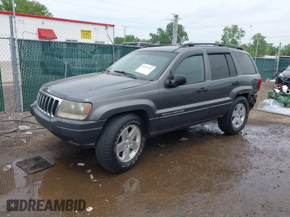 2003 Jeep Grand Cherokee Laredo z VIN 1J4GW48S73C545863, wystawiony jako IAAI lot #42222247 z przebiegiem 128 529 mil mil oraz . Historia ofert i sprzedaży dostępna na DreamBid. Obrazek 2.