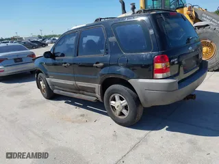 2001 Ford Escape XLT with VIN 1FMYU031X1KF31462, listed as a IAAI auction lot 41784891 with 372,527 mi miles. Bid and sale history available at carsss.com. Image 14.