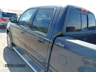 2001 Ford F-150 XLT with VIN 1FTRW08L71KA41543, listed as a IAAI auction lot 42205400 with 69,454 mi miles and . Bid and sale history available at DreamBid. Image 13.
