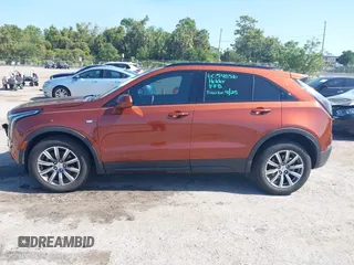 2019 Cadillac XT4 FWD Sport z VIN 1GYFZER4XKF103780, wystawiony jako IAAI lot #42171306 z przebiegiem 99 260 mil mil oraz . Historia ofert i sprzedaży dostępna na DreamBid. Obrazek 14.