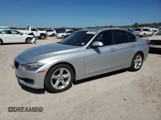 2013 BMW 3 Series 320i with VIN WBA3B1C50DK128525, listed as a Copart auction lot 48618015 with 124,304 mi miles and Salvage Title. Bid and sale history available at carsss.com. Image 1.