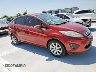 2013 Ford Fiesta SE z VIN 3FADP4BJXDM193759, wystawiony jako Copart lot #58230835 z przebiegiem 174 158 mil mil oraz Czysty tytuł • Clean title. Historia ofert i sprzedaży dostępna na DreamBid. Obrazek 4.