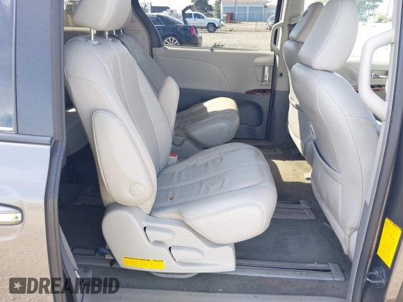 2014 Toyota Sienna XLE with VIN 5TDYK3DC5ES451965, listed as a IAAI auction lot 41879334 with 145,114 mi miles and . Bid and sale history available at DreamBid. Image 8.