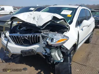 2014 Buick Encore Premium with VIN KL4CJDSB5EB685313, listed as a IAAI auction lot 41791827 with 62,616 mi miles. Bid and sale history available at carsss.com. Image 2.