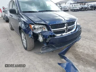 2016 Dodge Grand Caravan SE with VIN 2C4RDGBG4GR146450, listed as a IAAI auction lot 42015145 with 128,725 mi miles. Bid and sale history available at carsss.com. Image 6.