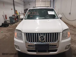 2011 Mercury Mariner Premier with VIN 4M2CN9HG3BKJ02026, listed as a IAAI auction lot 40254703 with 99,000 mi miles. Bid and sale history available at carsss.com. Image 6.