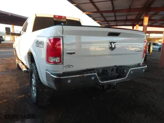 2018 Ram 2500 Laramie with VIN 3C6UR5FL0JG115269, listed as a IAAI auction lot 41310111 with 134,756 mi miles. Bid and sale history available at carsss.com. Image 3.
