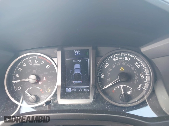 2020 Toyota Tacoma SR5 with VIN 3TMDZ5BN3LM080702, listed as a IAAI auction lot 42463811 with 70,185 mi miles and . Bid and sale history available at DreamBid. Image 7.