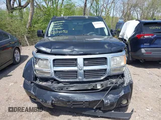 2009 Dodge Nitro SE z VIN 1D8GT28K69W505396, wystawiony jako IAAI lot #42104252 z przebiegiem 144 026 mil mil oraz . Historia ofert i sprzedaży dostępna na DreamBid. Obrazek 12.