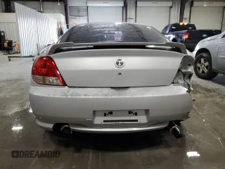 2006 Hyundai Tiburon GT z VIN KMHHN65F96U203924, wystawiony jako Copart lot #43624185 z przebiegiem 120 403 mil mil oraz Szkoda całkowita • Salvage title. Historia ofert i sprzedaży dostępna na DreamBid. Obrazek 6.