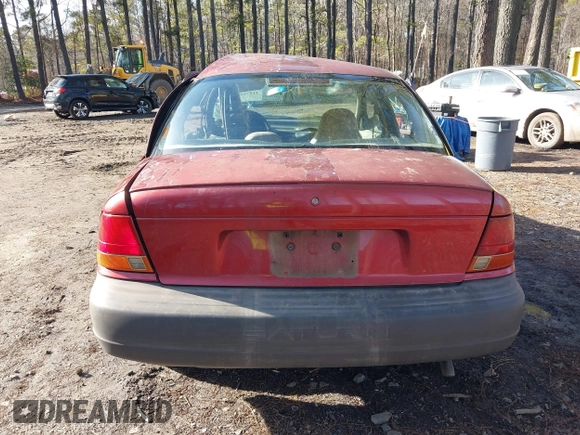 1997 Saturn SL with VIN 1G8ZF528XVZ325466, listed as a IAAI auction lot 41576703 with 237,089 mi miles. Bid and sale history available at carsss.com. Image 16.