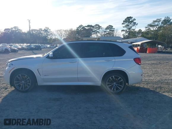 2015 BMW X5 xDrive50i z VIN 5UXKR6C58F0J78013, wystawiony jako IAAI lot #41335257 z przebiegiem Nie podano mil oraz . Historia ofert i sprzedaży dostępna na DreamBid. Obrazek 13.
