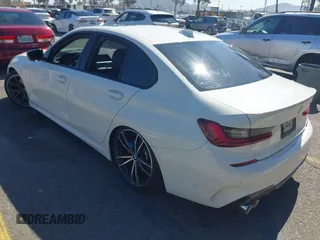 2022 BMW 3 Series M340i with VIN 3MW5U7J01N8C40721, listed as a IAAI auction lot 41651842 with 31,756 mi miles. Bid and sale history available at carsss.com. Image 3.