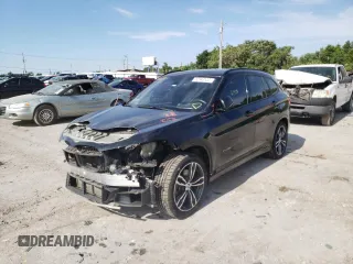 2018 BMW X1 sDrive28i with VIN WBXHU7C35J5H40837, listed as a Copart auction lot 52343122 with 61,458 mi miles. Bid and sale history available at carsss.com. Image 2.