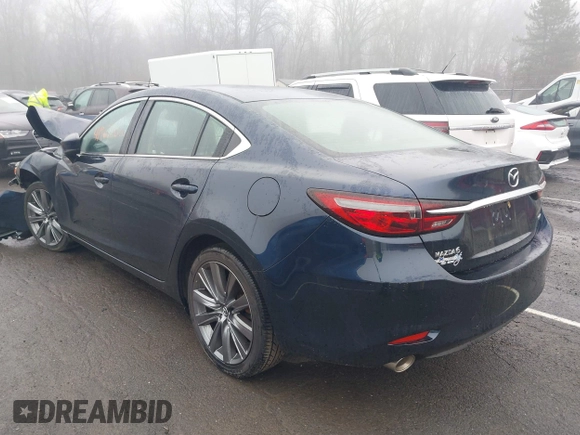 2021 Mazda 6 Touring with VIN JM1GL1VM4M1616243, listed as a IAAI auction lot 41907100 with 59,315 mi miles and . Bid and sale history available at carsss.com. Image 3.