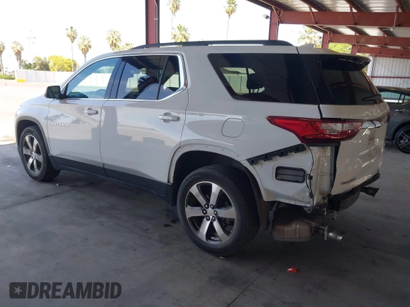 2021 Chevrolet Traverse LT with VIN 1GNERHKW8MJ232171, listed as a IAAI auction lot 42269142 with 88,830 mi miles and . Bid and sale history available at DreamBid. Image 3.