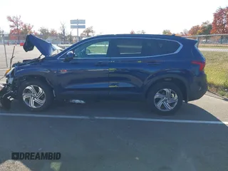 2023 Hyundai Santa Fe SE z VIN 5NMS1DAJ0PH552080, wystawiony jako IAAI lot #40653004 z przebiegiem 5 982 mil mil oraz . Historia ofert i sprzedaży dostępna na DreamBid. Obrazek 14.