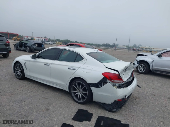 2020 Genesis G70 2.0T with VIN KMTG44LA8LU064798, listed as a IAAI auction lot 41878098 with 57,995 mi miles. Bid and sale history available at carsss.com. Image 3.