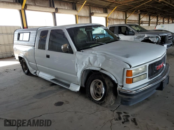 1994 GMC Sierra 1500 with VIN 1GDEC19K8RE532146, listed as a Copart auction lot 52120825 with 232,171 mi miles and Salvage Title. Bid and sale history available at DreamBid. Image 4.