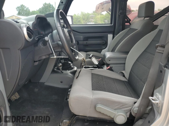 2009 Jeep Wrangler X with VIN 1J4FA24159L730840, listed as a Copart auction lot 56278745 with 95,851 mi miles and Salvage title. Bid and sale history available at DreamBid. Image 7.