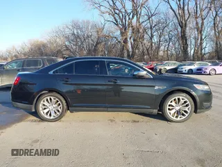 2015 Ford Taurus Limited z VIN 1FAHP2F82FG170860, wystawiony jako IAAI lot #41054787 z przebiegiem 103 146 mil mil oraz . Historia ofert i sprzedaży dostępna na DreamBid. Obrazek 13.