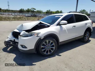 2015 Mazda CX-9 Grand Touring z VIN JM3TB2DAXF0465598, wystawiony jako Copart lot #51631725 z przebiegiem 163 088 mil mil oraz Czysty tytuł • Clean title. Historia ofert i sprzedaży dostępna na DreamBid. Obrazek 1.