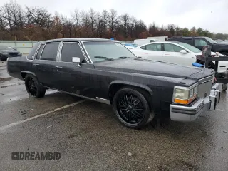 1989 Cadillac Brougham z VIN 1G6DW51Y9KR725809, wystawiony jako Copart lot #80902764 z przebiegiem 56 033 mil mil oraz Szkody całkowita. Historia ofert i sprzedaży dostępna na DreamBid. Obrazek 4.