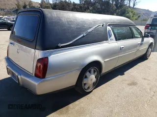 2003 Cadillac DTS Professional 1SH z VIN 1GEEH00Y93U500263, wystawiony jako Copart lot #77037214 z przebiegiem 63 197 mil mil oraz Tytuł czysty. Historia ofert i sprzedaży dostępna na DreamBid. Obrazek 3.