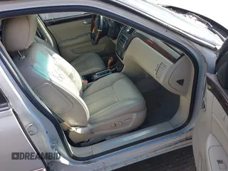 2010 Cadillac DTS w/1SC with VIN 1G6KD5EY2AU105662, listed as a IAAI auction lot 41739669 with 126,335 mi miles. Bid and sale history available at carsss.com. Image 5.